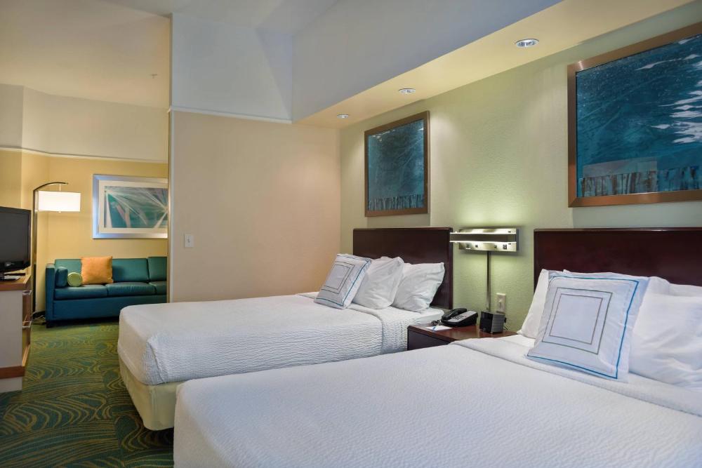 Double Suite with Two Double Beds and Trundle Sofa - Communication Assistance interior